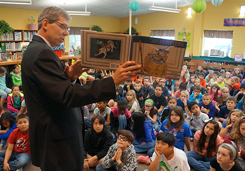 Dr. Lyon Reads to Students at Smith Dr. Lyon Reads to Students at Smith
